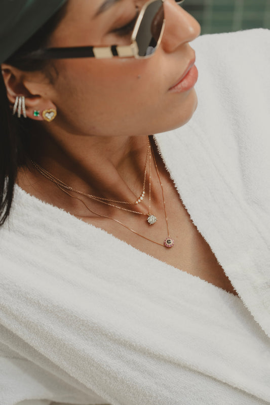 CADENA FLOR ORO ROSA Flor Amazona Colombia